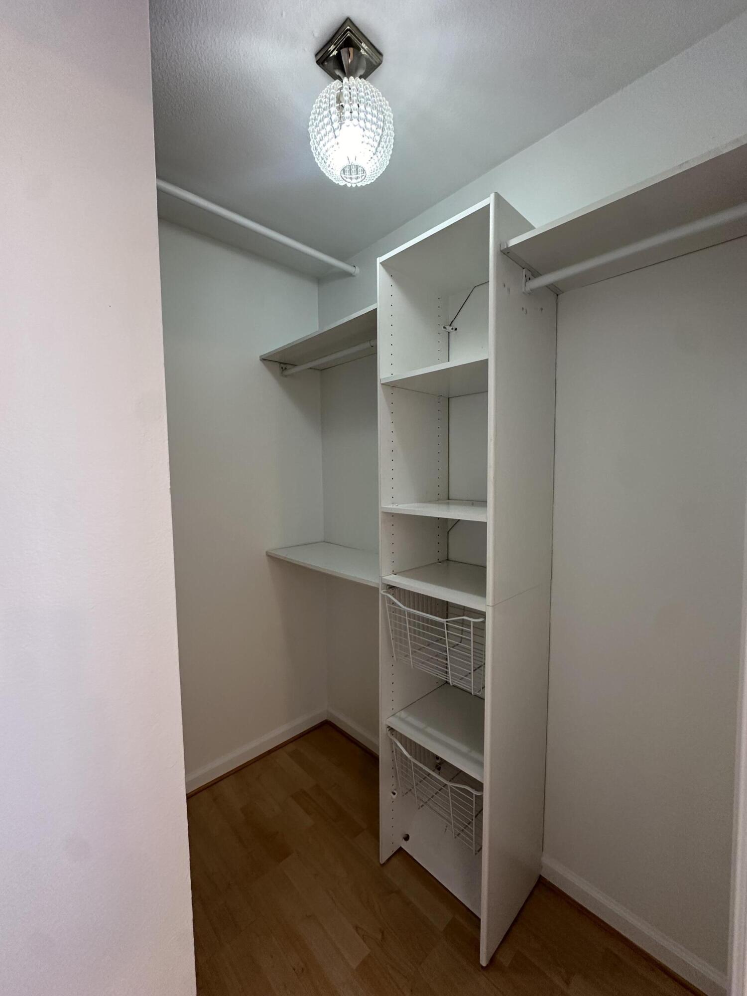 72631 Thrush Road, Unit 2 Palm Desert, CA 92260 - Photo 14 of 20 a view of a room with rack on the wall