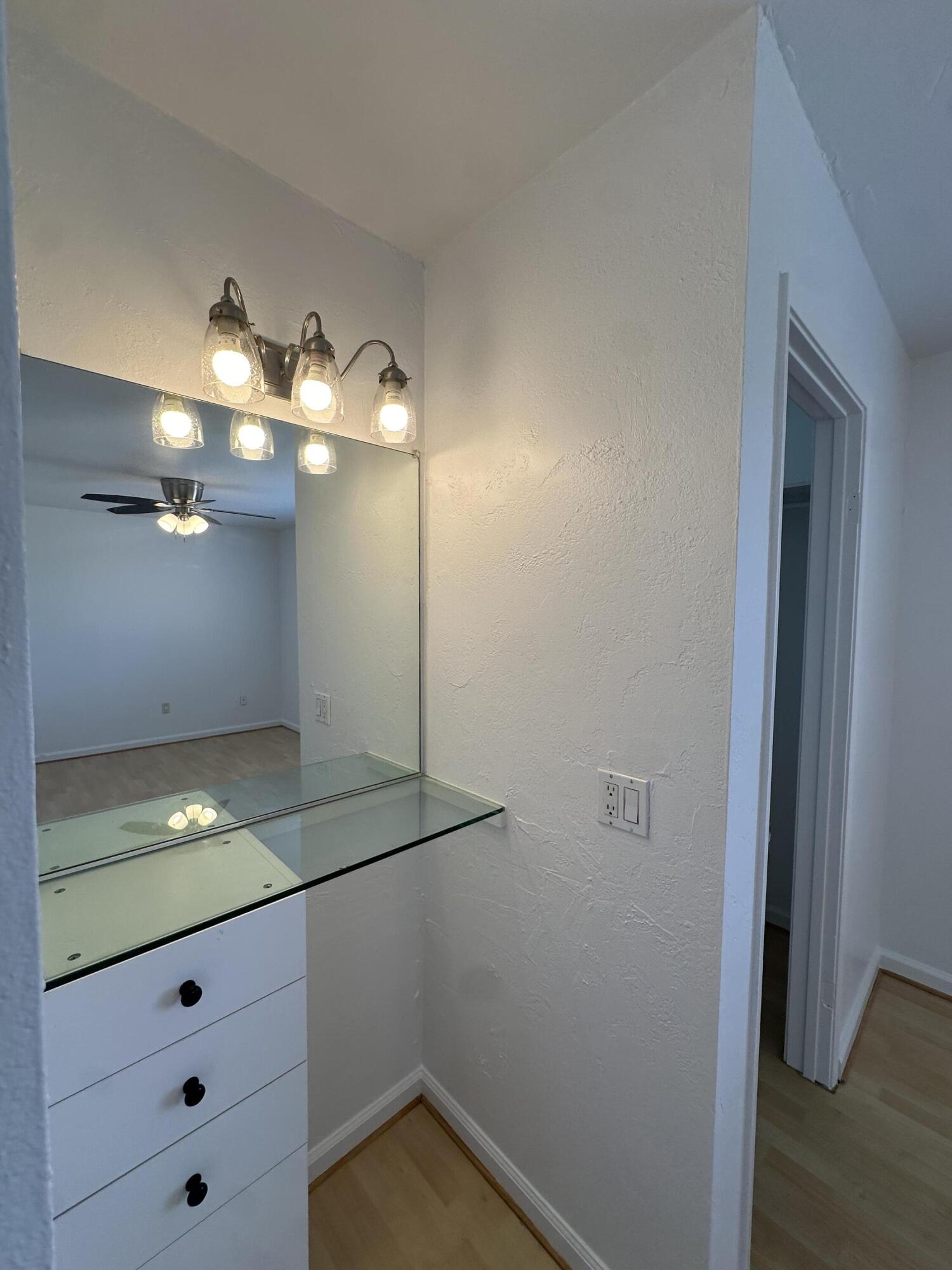 72631 Thrush Road, Unit 2 Palm Desert, CA 92260 - Photo 15 of 20 a bathroom with a shower and vanity