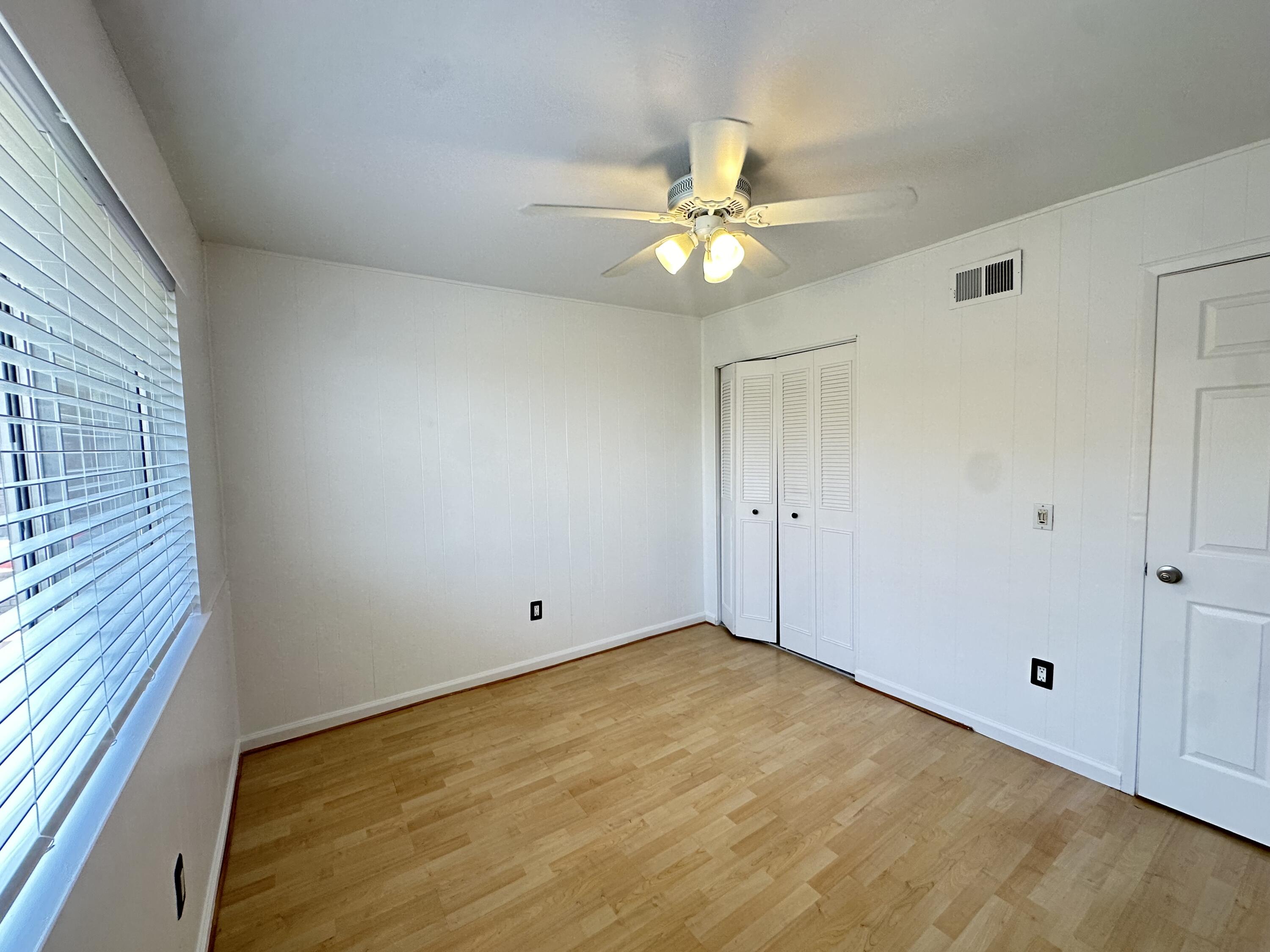 72631 Thrush Road, Unit 2 Palm Desert, CA 92260 - Photo 10 of 20 a view of an empty room with a window