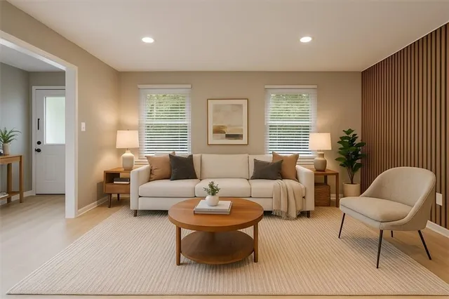 a kitchen with a refrigerator a sink and cabinets