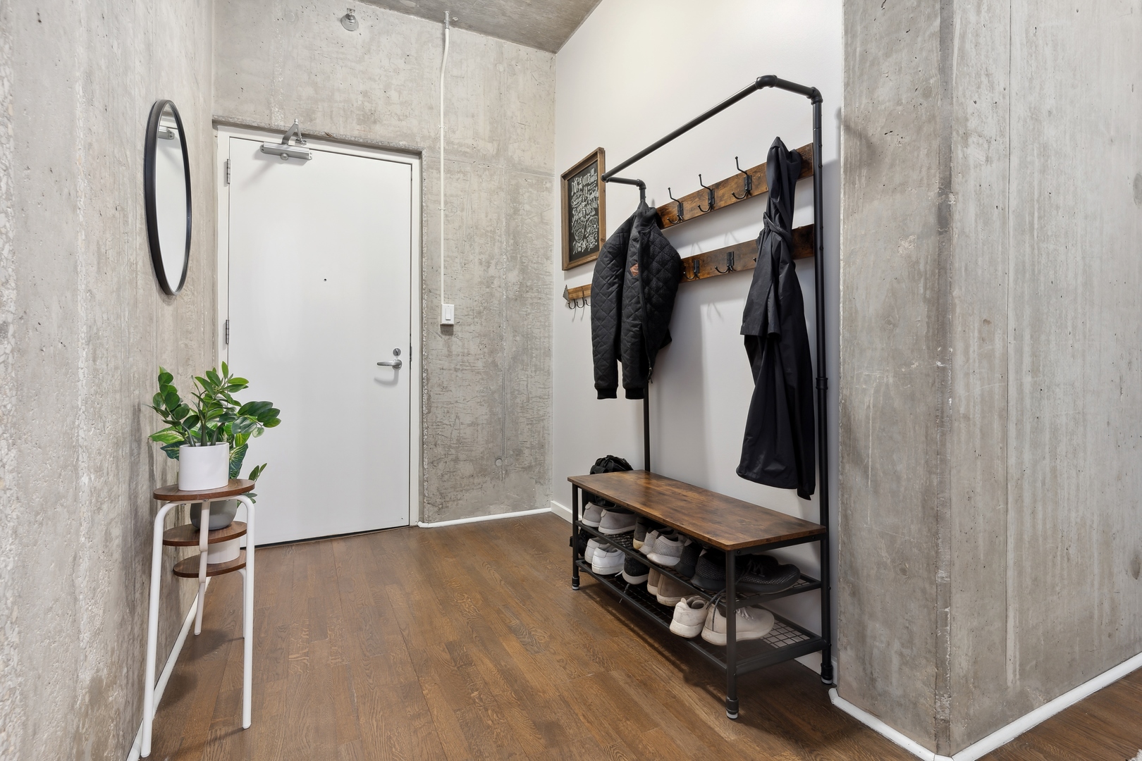 321 South Sangamon Street, Unit 603 Chicago, IL 60607 - Photo 2 of 12 a view of walk in closet with clothes and shoes