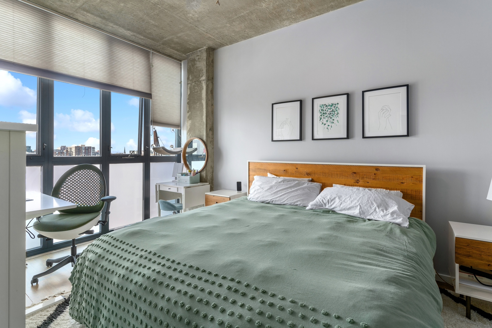 321 South Sangamon Street, Unit 603 Chicago, IL 60607 - Photo 10 of 12 a bedroom with a bed and a cabinets
