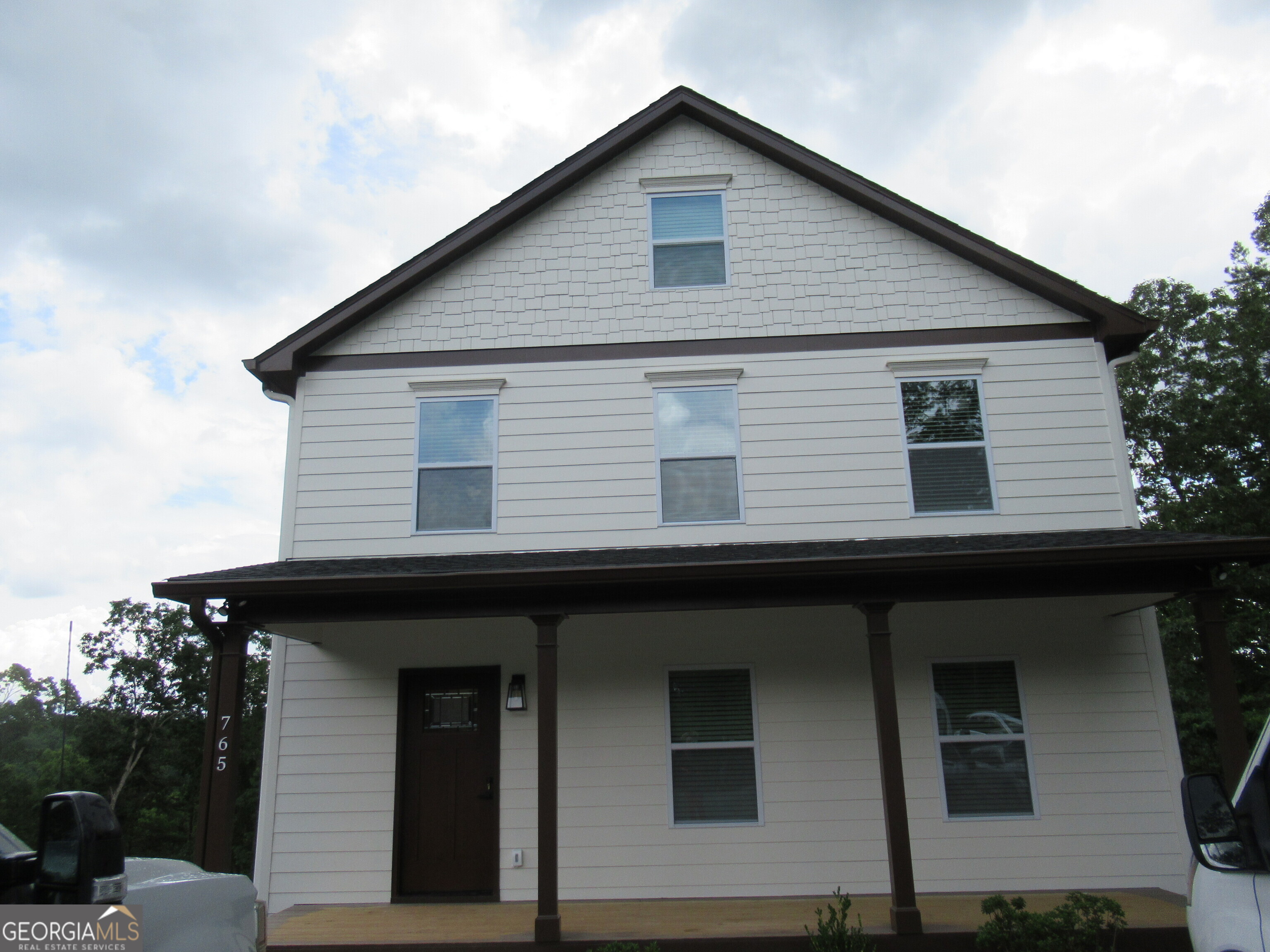 765 Old Kerns Road Dawsonville, GA 30534 - Photo 2 of 36 a front view of a house