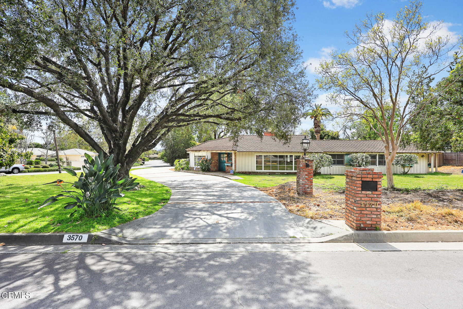 3570 Lombardy Road Pasadena, CA 91107 - Photo 1 of 45 a front view of a house with a yard
