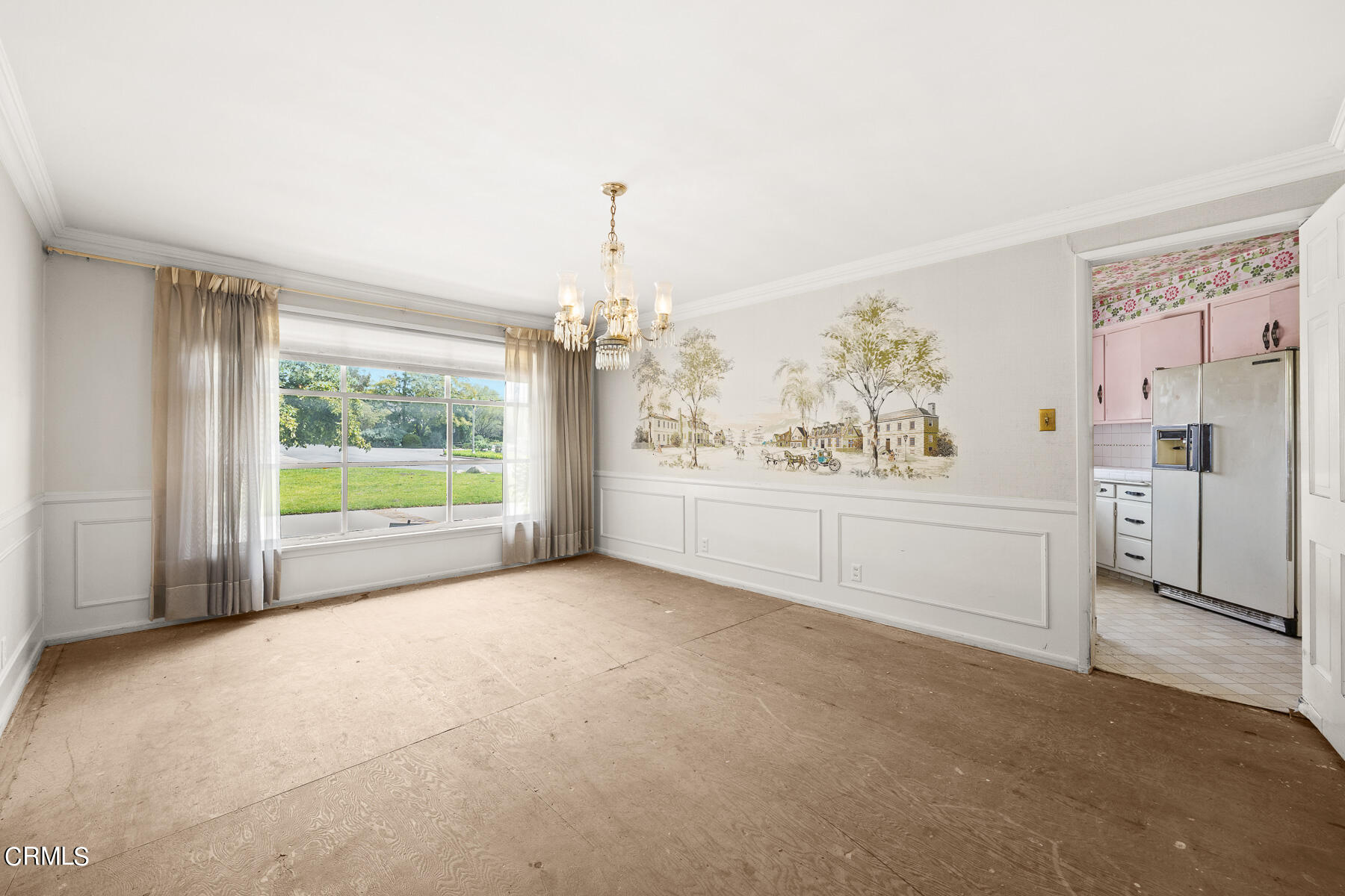 3570 Lombardy Road Pasadena, CA 91107 - Photo 13 of 45 a view of a big room with windows and chandelier fan