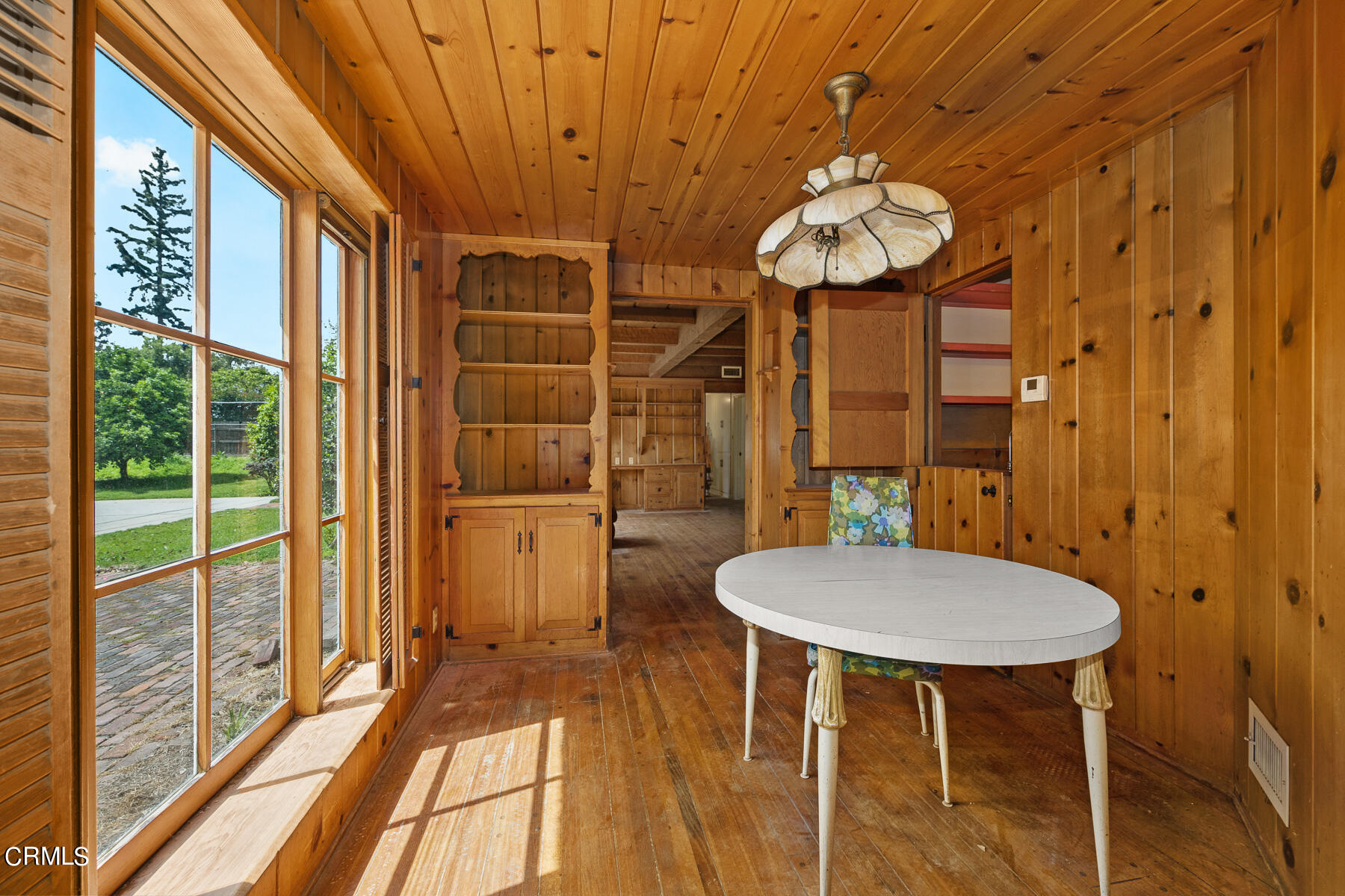 3570 Lombardy Road Pasadena, CA 91107 - Photo 21 of 45 a view of a room with a chandelier and wooden floor