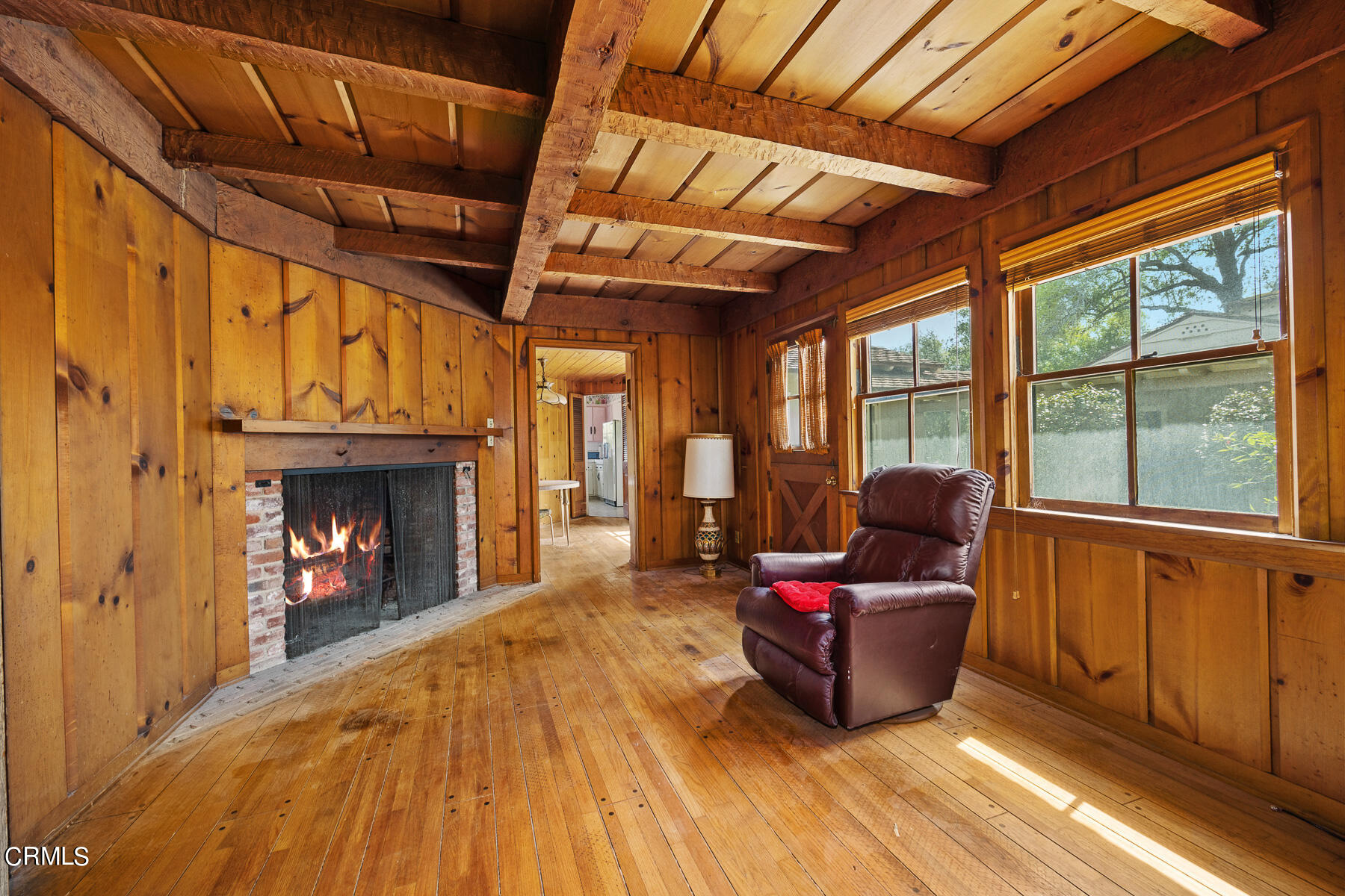 3570 Lombardy Road Pasadena, CA 91107 - Photo 22 of 45 a living room with furniture and a fireplace