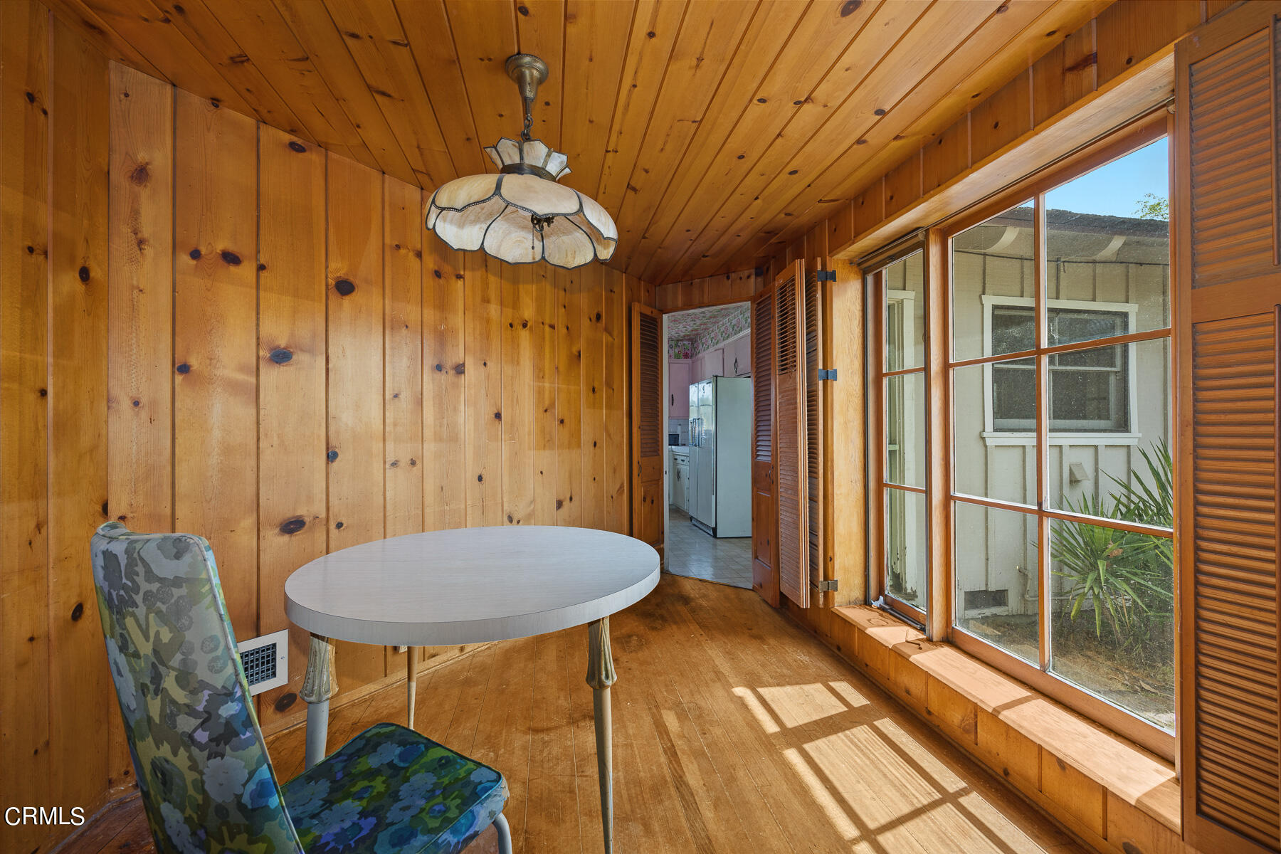 3570 Lombardy Road Pasadena, CA 91107 - Photo 23 of 45 a view of a dining room with a table and chairs