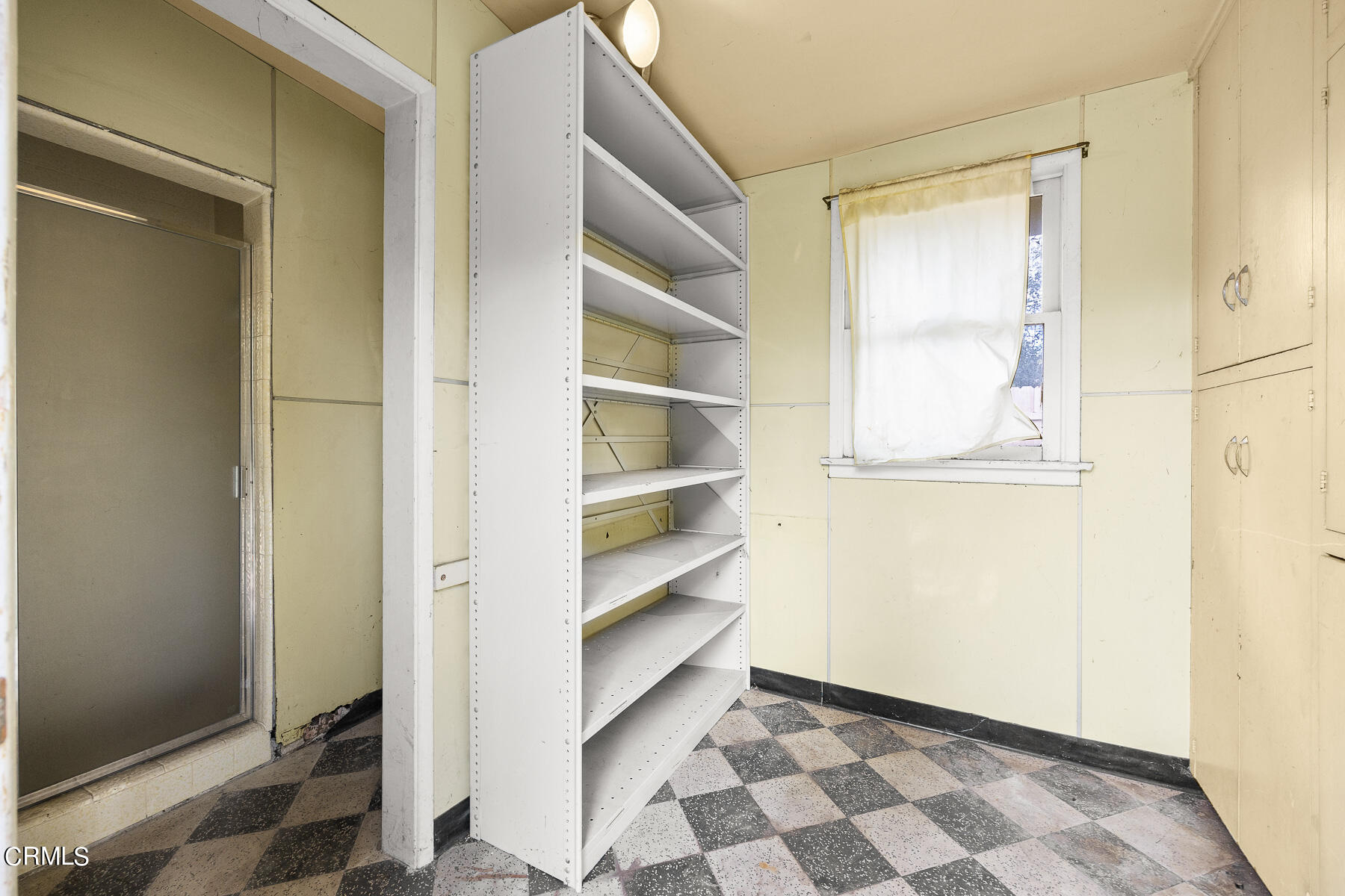 3570 Lombardy Road Pasadena, CA 91107 - Photo 34 of 45 a view of an empty room and a window