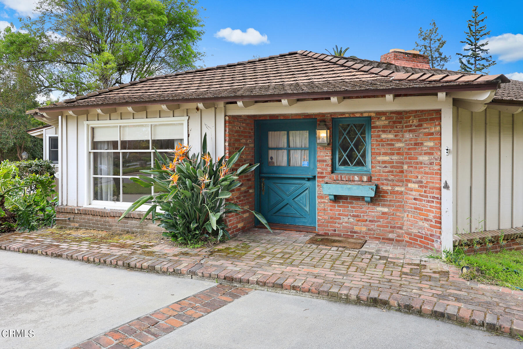 3570 Lombardy Road Pasadena, CA 91107 - Photo 9 of 45 a view of a house with potted plants