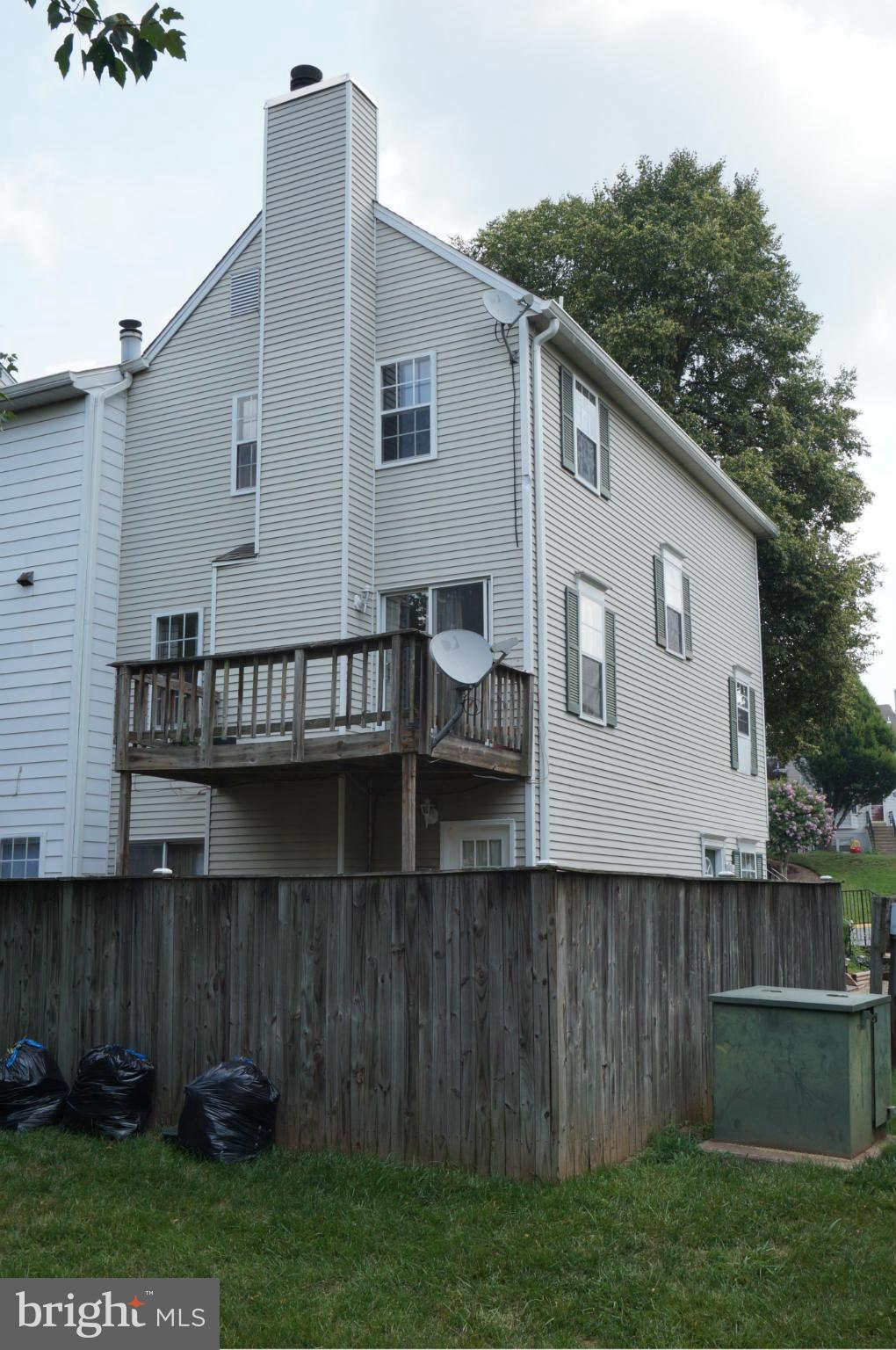 4062 Spring Run Court, Unit 11A Chantilly, VA 20151 - Photo 4 of 30 Backyard with Deck
