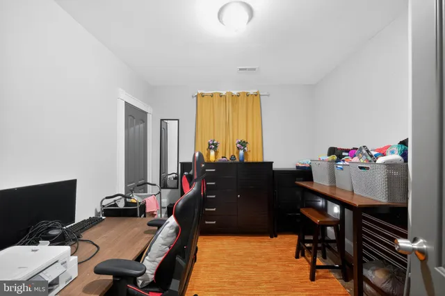 a view of a workspace with furniture