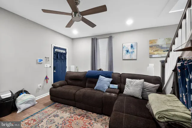 a living room with furniture and a couch