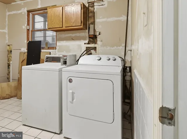 a front view of a house with large garden
