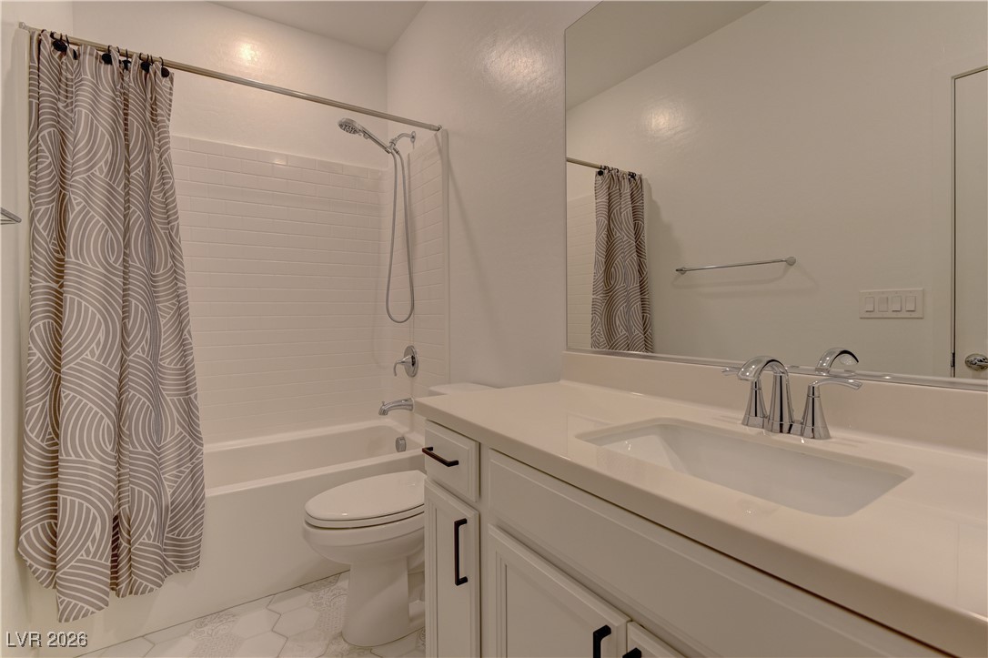 727 Foreign Reef Way Las Vegas, NV 89138 - Photo 23 of 25 Full bathroom with shower / bath combo and vanity