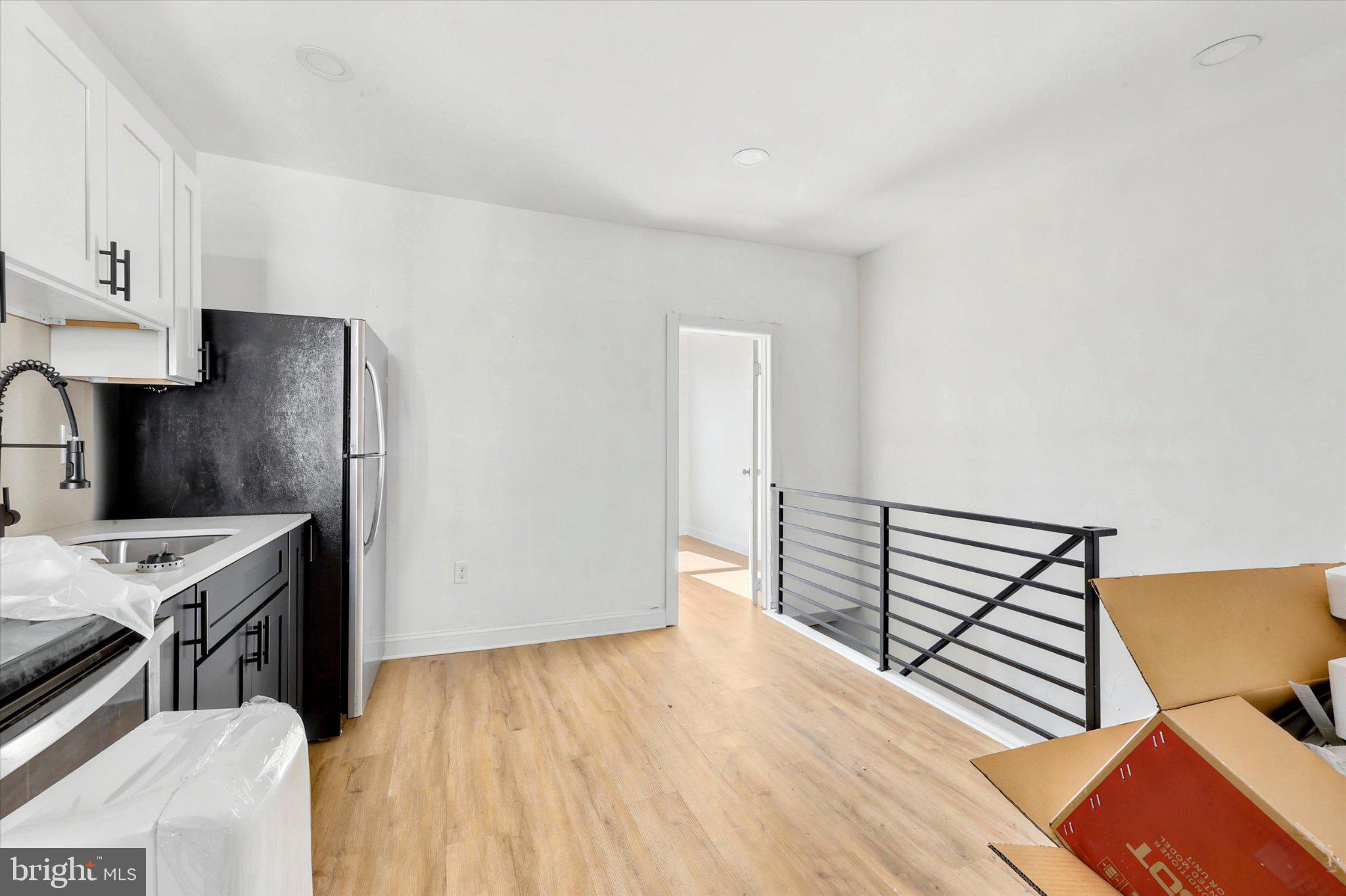2046 South Norwood Street, Unit 2 Philadelphia, PA 19145 - Photo 11 of 17 Modern kitchen with open layout charm.