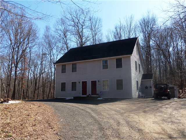 115 Jacob Road Southbury, CT 06488 - Photo 1 of 1 a front view of a house with a yard