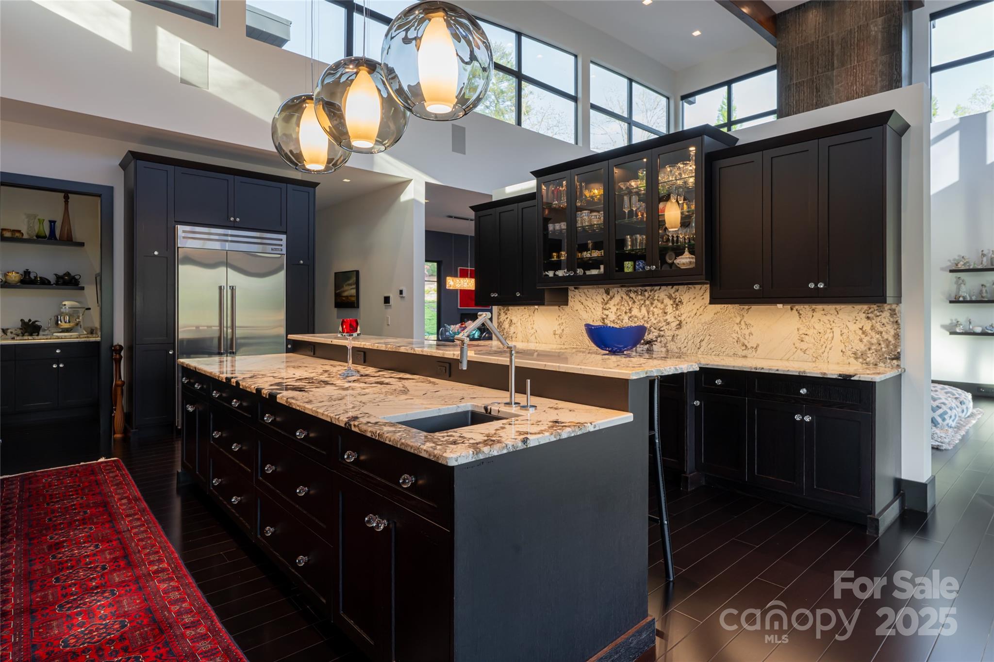 32 Brookline Drive Asheville, NC 28803 - Photo 12 of 44 a kitchen with a sink stove and cabinets