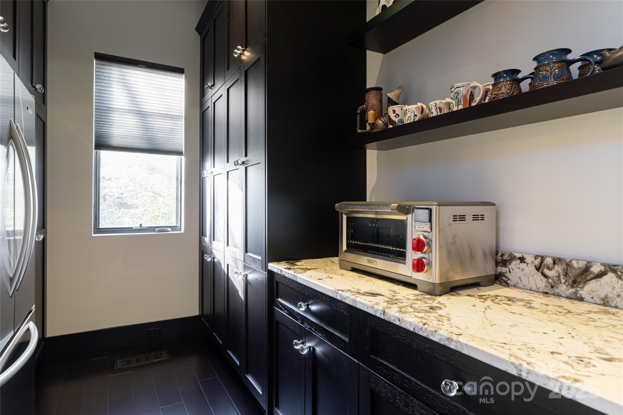 32 Brookline Drive Asheville, NC 28803 - Photo 15 of 44 a room with a bed and a television