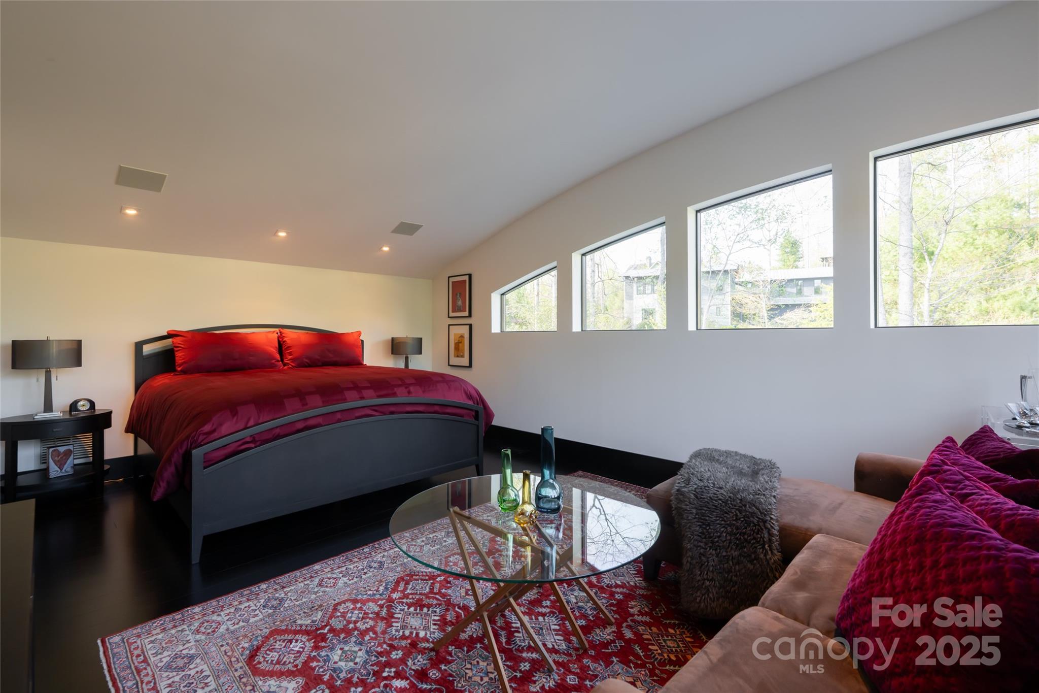 32 Brookline Drive Asheville, NC 28803 - Photo 23 of 44 a bed room with two bed and a lamp