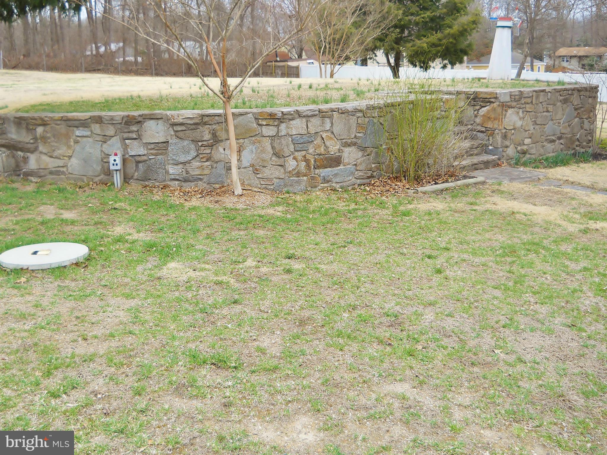192 Magothy Beach Road Pasadena, MD 21122 - Photo 16 of 29 80 Ton Stone Retaining Wall