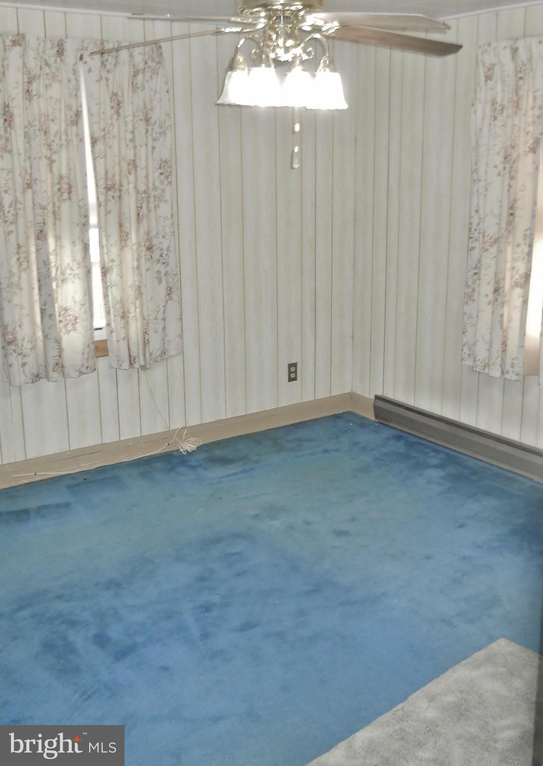 192 Magothy Beach Road Pasadena, MD 21122 - Photo 26 of 29 2nd Bedroom w/ Hardwood Floor under carpet