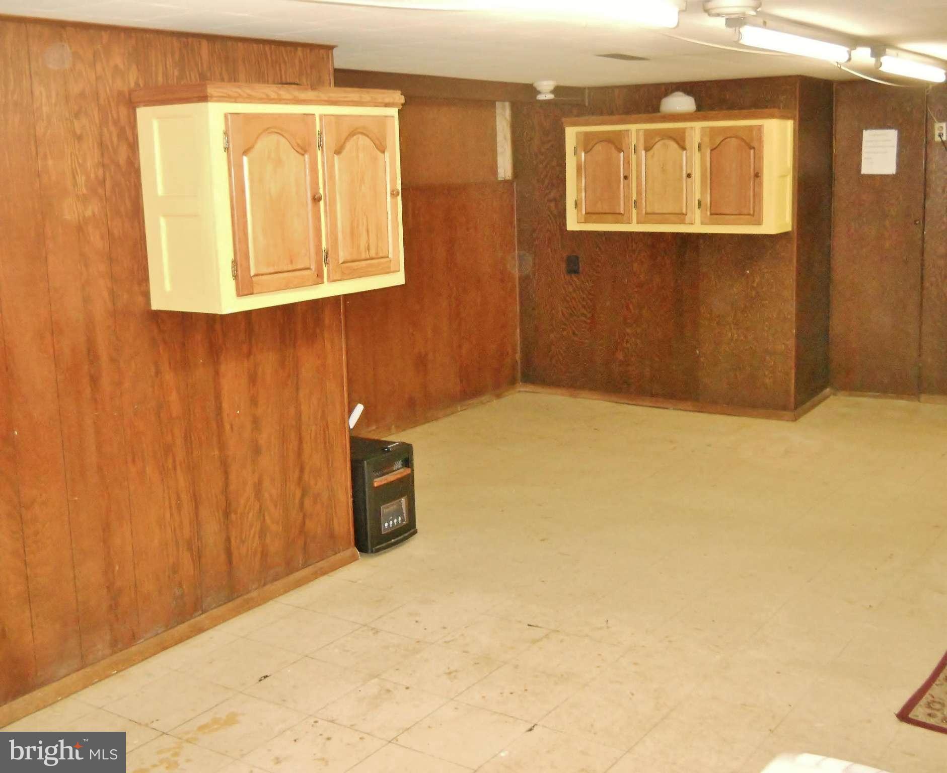 192 Magothy Beach Road Pasadena, MD 21122 - Photo 28 of 29 Partially Finished Lower Level Family Room