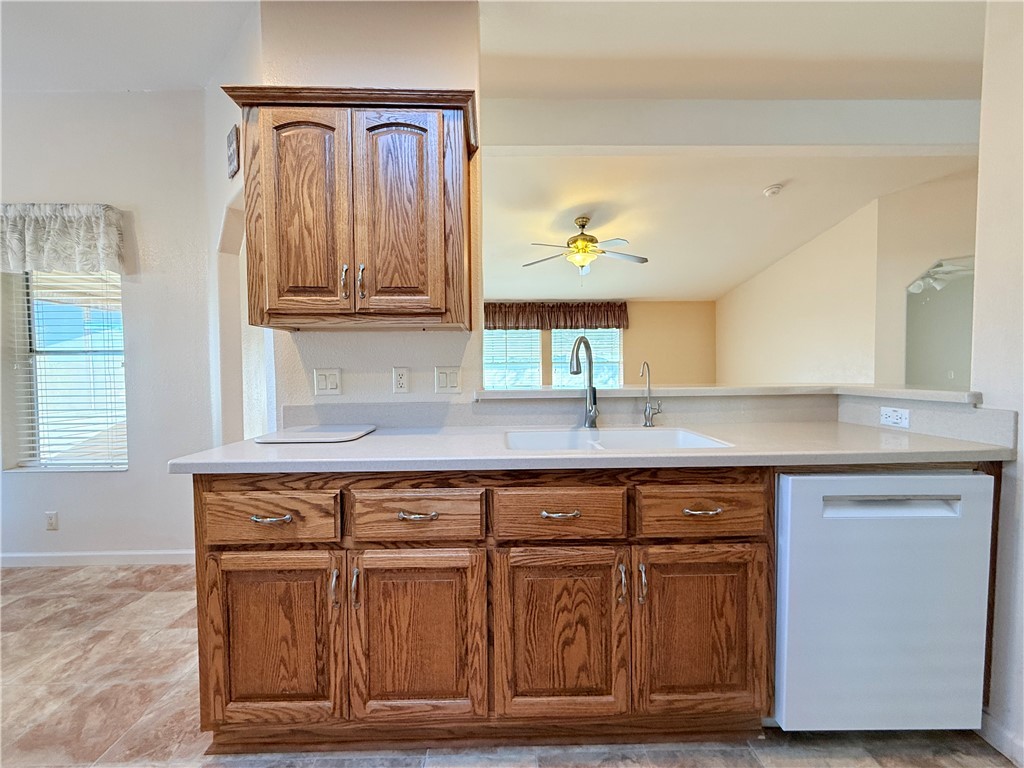 2350 Adobe Road Road, Unit 191 Bullhead City, AZ 86442 - Photo 13 of 52 a kitchen with a sink and cabinets