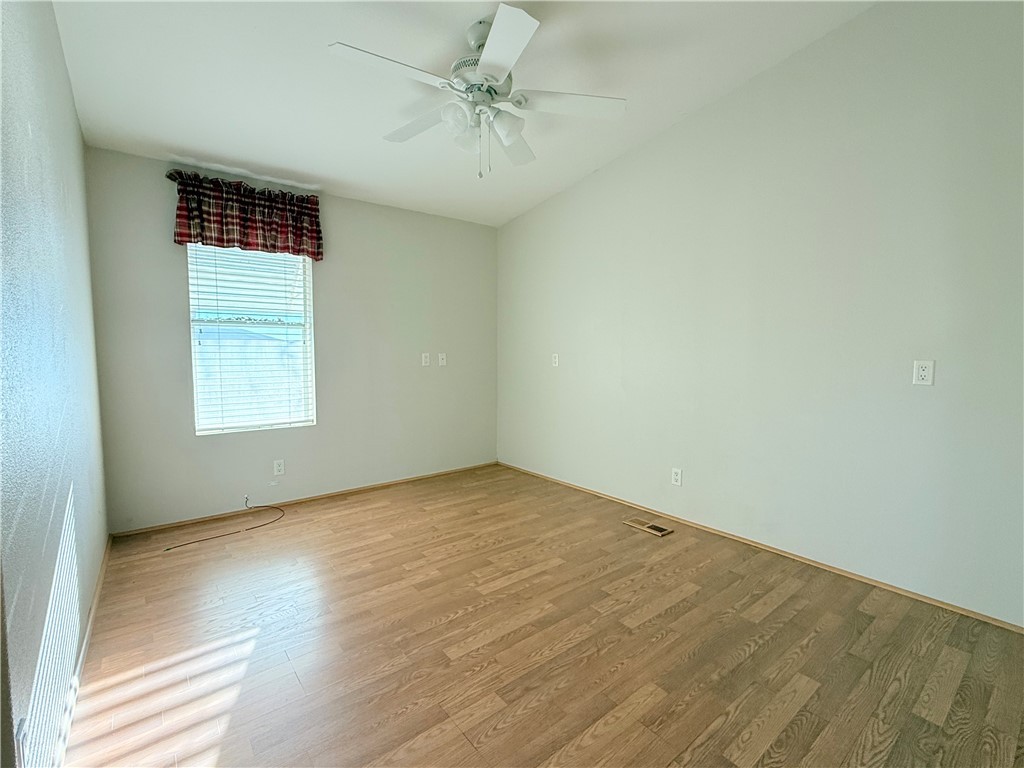 2350 Adobe Road Road, Unit 191 Bullhead City, AZ 86442 - Photo 18 of 52 an empty room with windows and fan