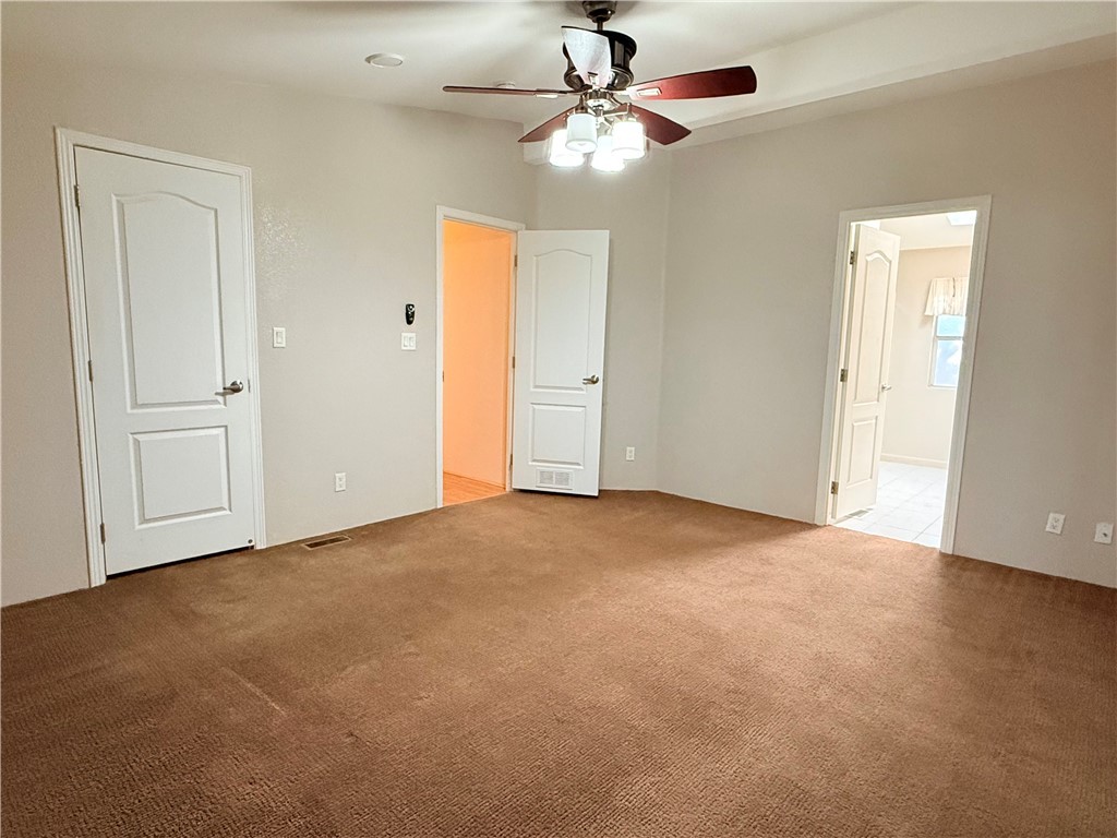 2350 Adobe Road Road, Unit 191 Bullhead City, AZ 86442 - Photo 26 of 52 a view of an empty room with a chandelier fan