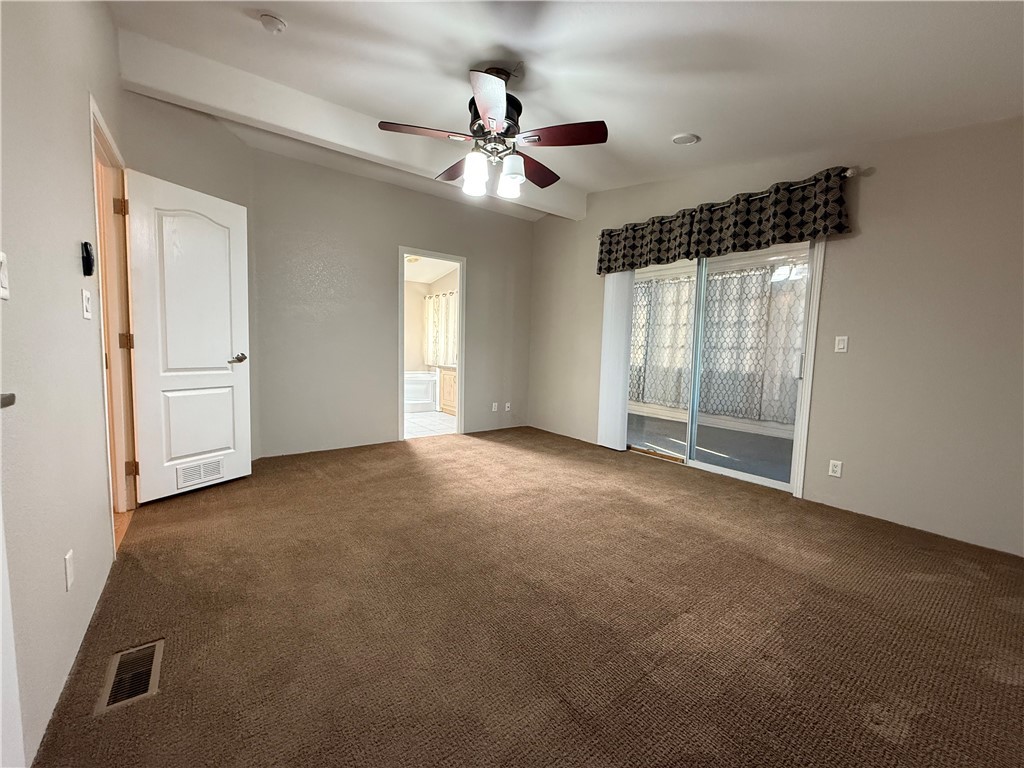2350 Adobe Road Road, Unit 191 Bullhead City, AZ 86442 - Photo 27 of 52 a view of an empty room with a ceiling fan