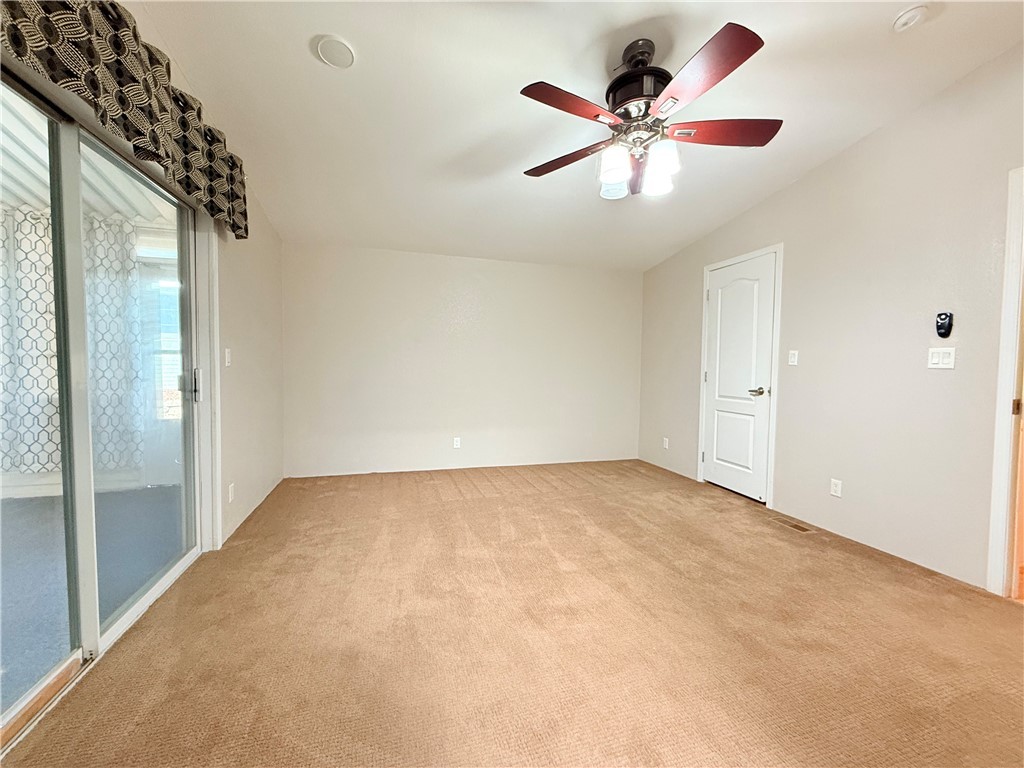 2350 Adobe Road Road, Unit 191 Bullhead City, AZ 86442 - Photo 28 of 52 an empty room with fan and windows