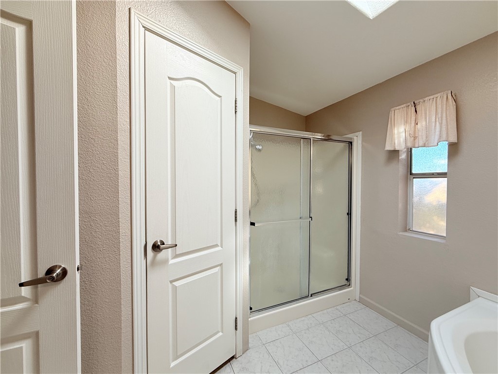 2350 Adobe Road Road, Unit 191 Bullhead City, AZ 86442 - Photo 31 of 52 a view of a bathroom with wooden floor mirror and window