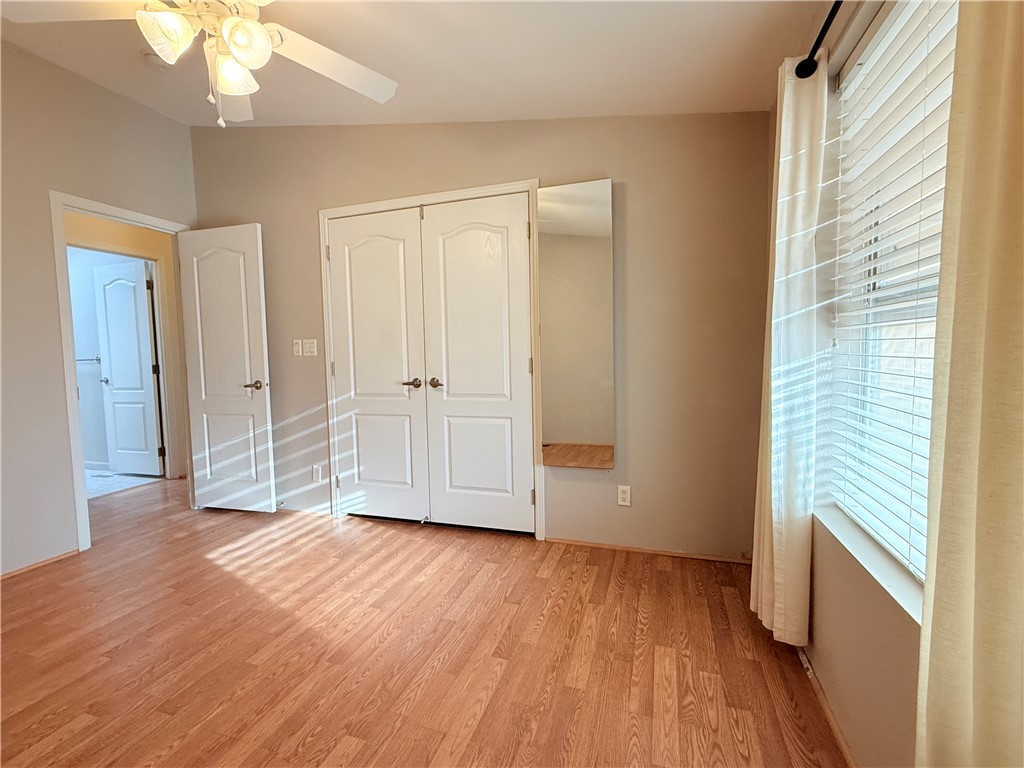 2350 Adobe Road Road, Unit 191 Bullhead City, AZ 86442 - Photo 37 of 52 a view of an empty room with wooden floor and a window