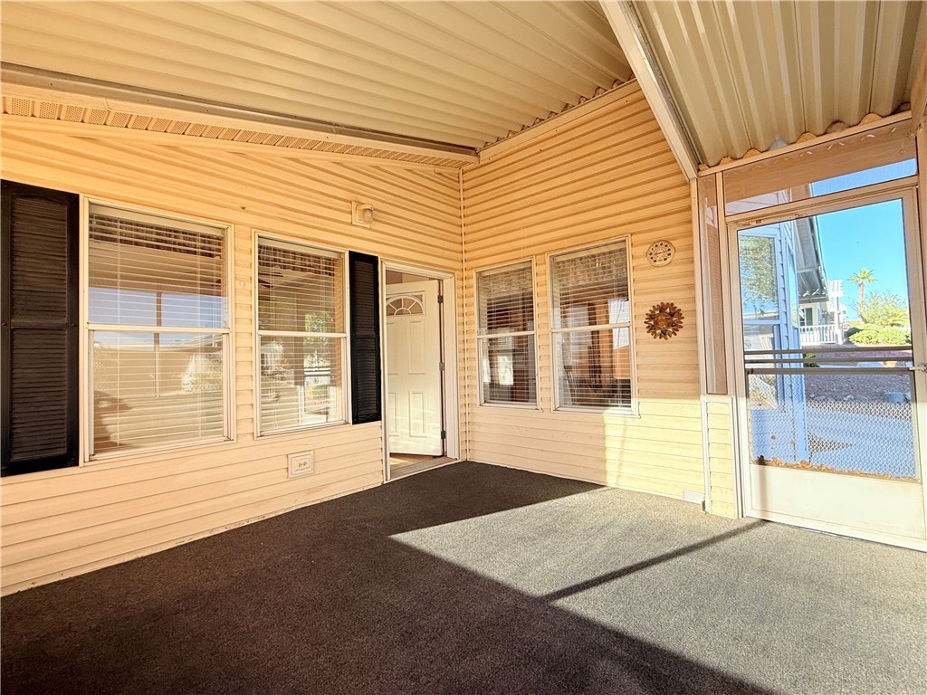 2350 Adobe Road Road, Unit 191 Bullhead City, AZ 86442 - Photo 43 of 52 a front view of a building with a outdoor space