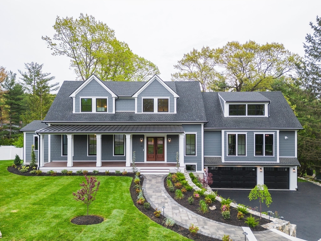 25 Lantern Road Belmont, MA 02478 - Photo 1 of 7 front view of a house with a yard