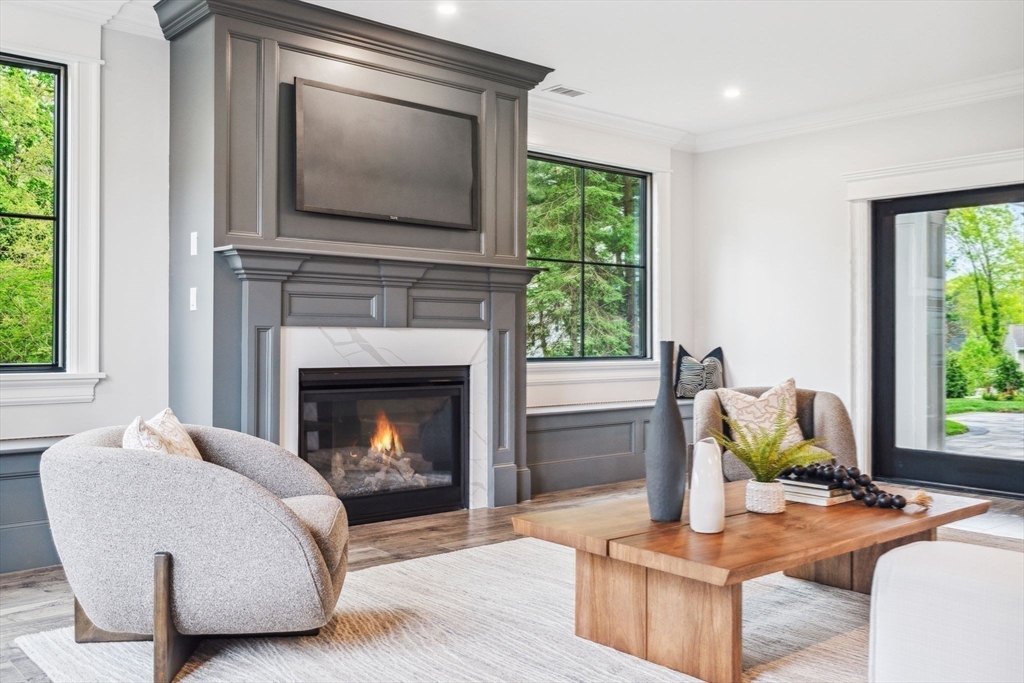 25 Lantern Road Belmont, MA 02478 - Photo 6 of 7 a living room with furniture and a fireplace