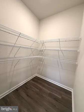 a view of a room with racks on the wall