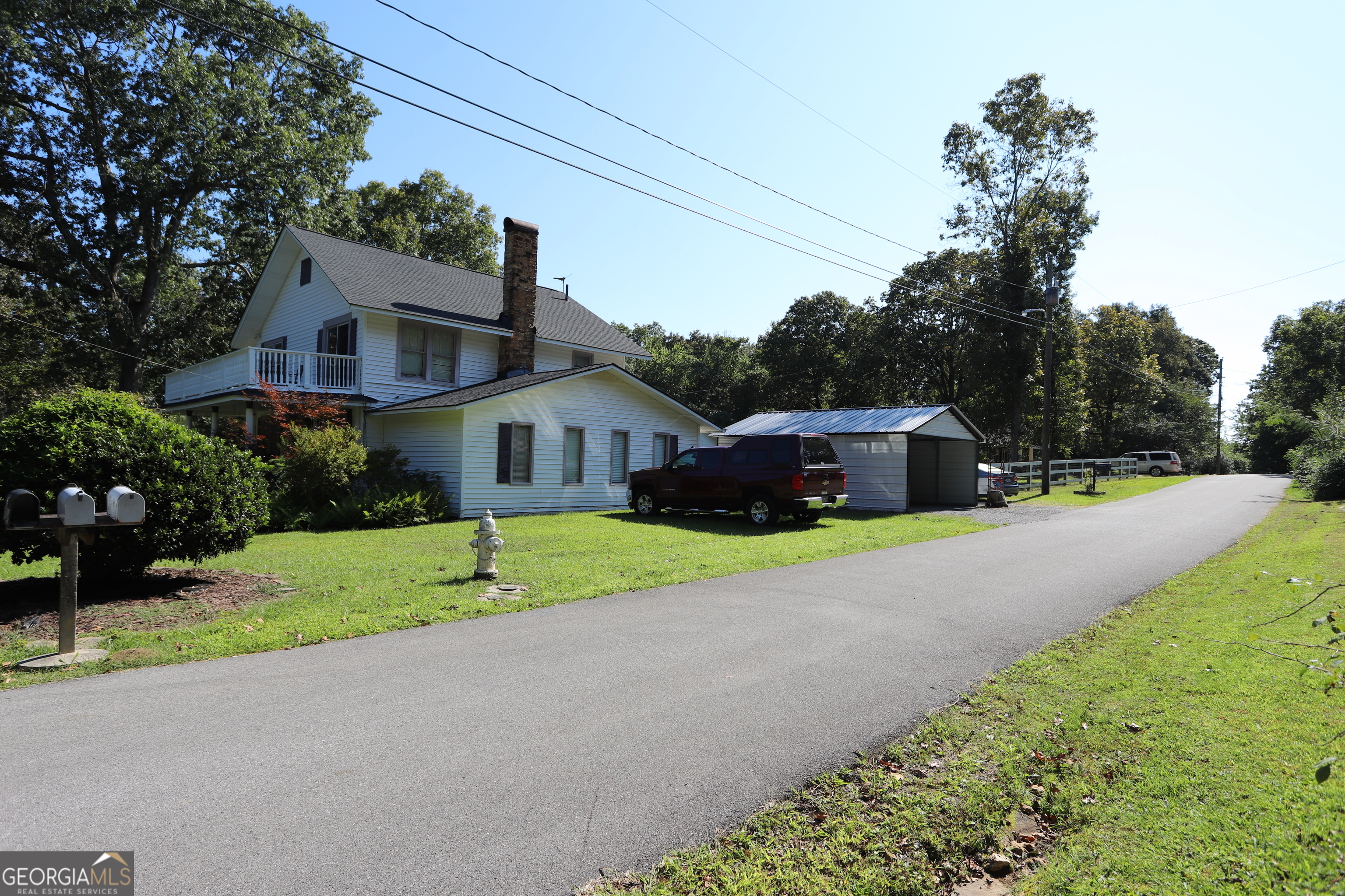 51 Cedar Street Menlo, GA 30731 - Photo 11 of 86 a front view of house with yard and green space
