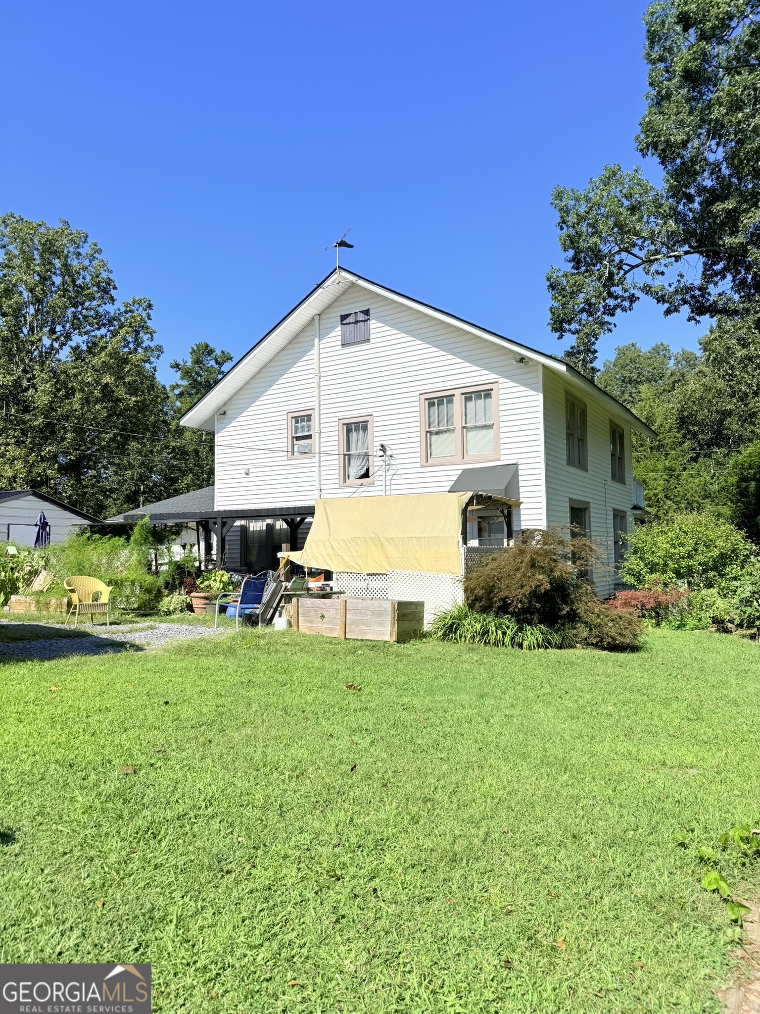 51 Cedar Street Menlo, GA 30731 - Photo 15 of 86 a front view of house with yard and green space