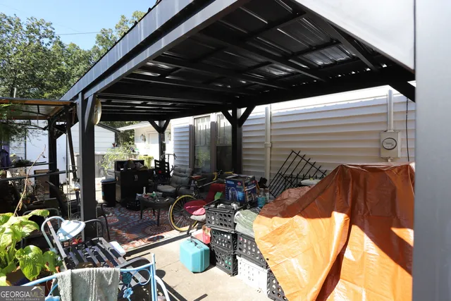 a view of a house with yard and a garden