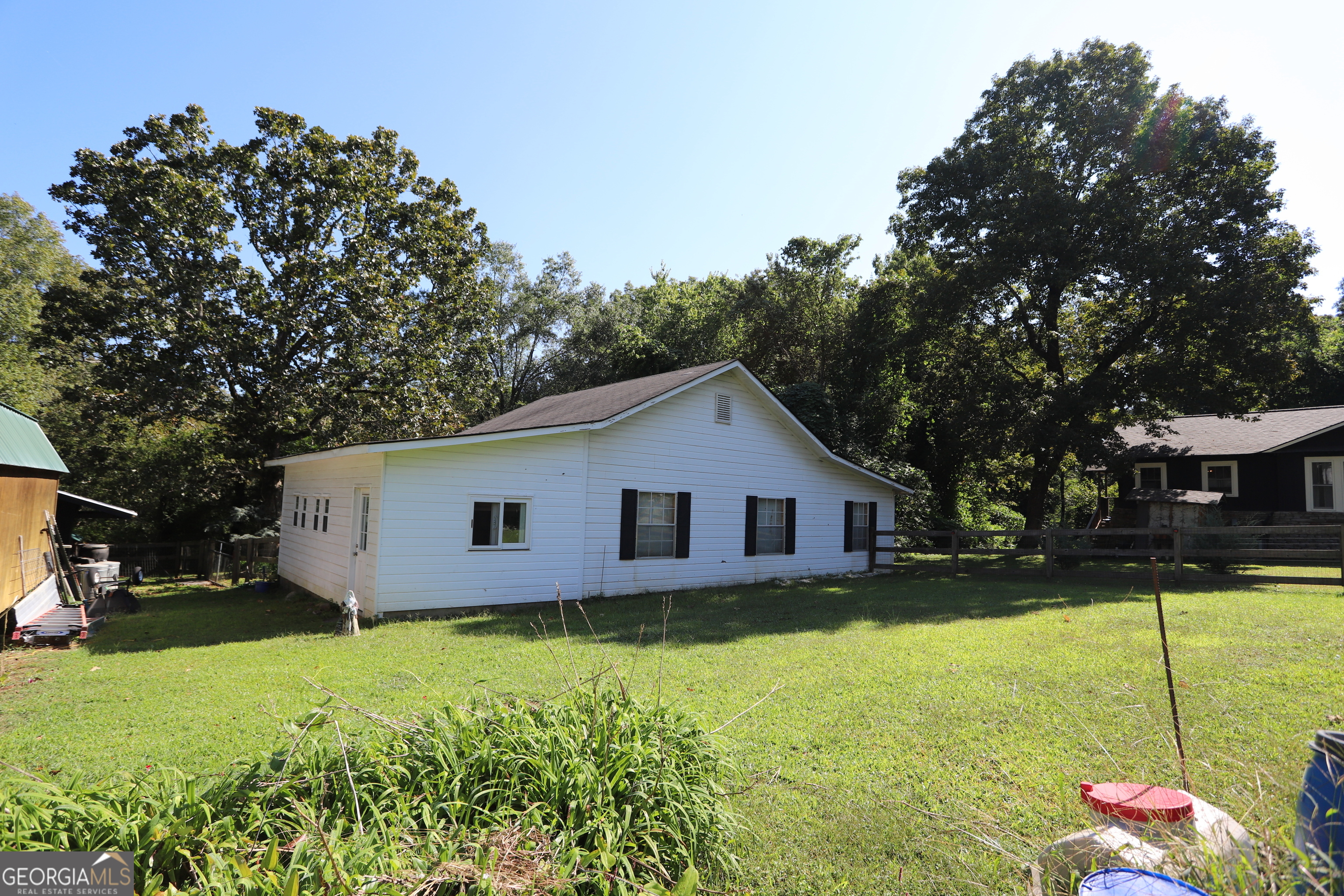 51 Cedar Street Menlo, GA 30731 - Photo 36 of 86 a view of a house with a backyard