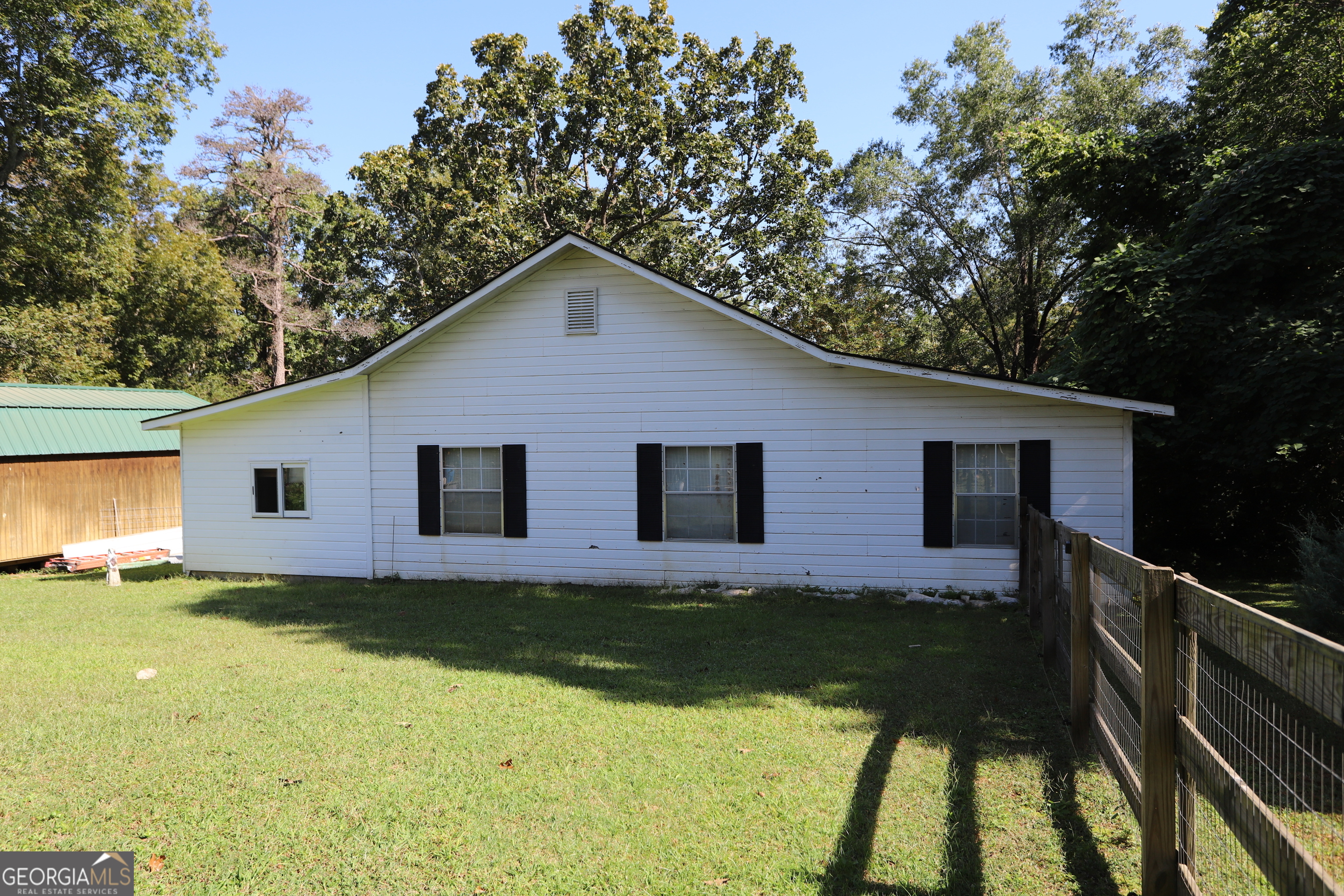 51 Cedar Street Menlo, GA 30731 - Photo 37 of 86 a house view with a garden space