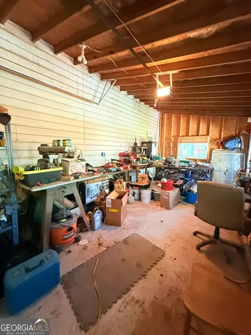 a room with furniture and a large window