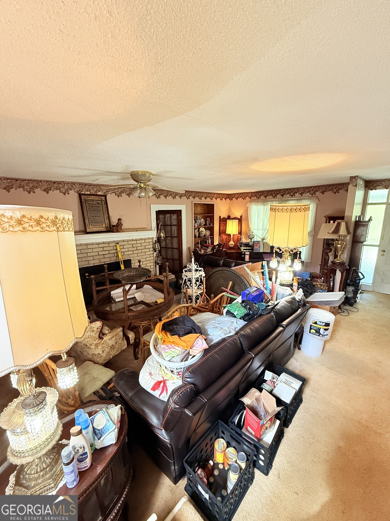 51 Cedar Street Menlo, GA 30731 - Photo 54 of 86 a living room with furniture a rug and a large window
