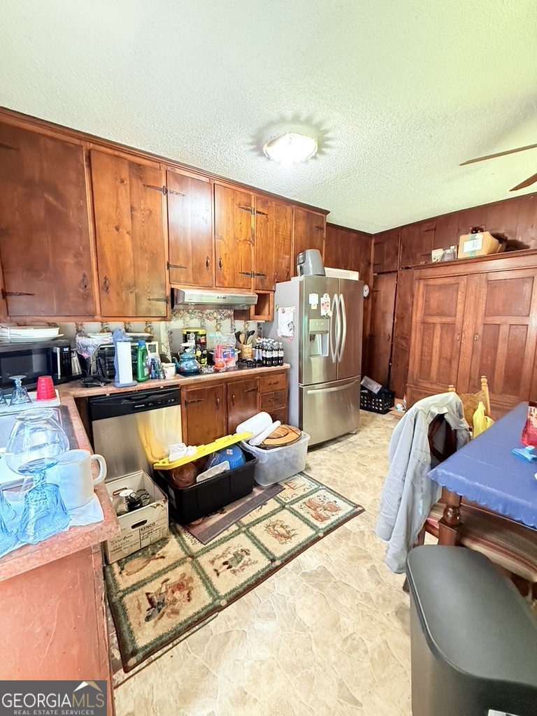 51 Cedar Street Menlo, GA 30731 - Photo 64 of 86 a living room with furniture and a floor to ceiling window