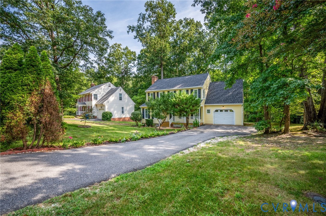 4820 Cedar Cliff Road Chester, VA 23831 - Photo 4 of 41 Colonial-style exterior with a paved driveway, att
