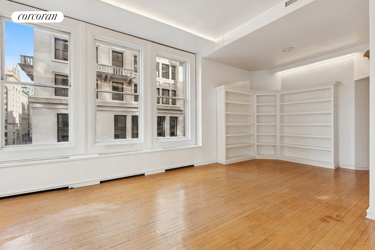 105 5th Avenue, Unit 4B Manhattan, NY 10003 - Photo 9 of 14 a view of an empty room with a window