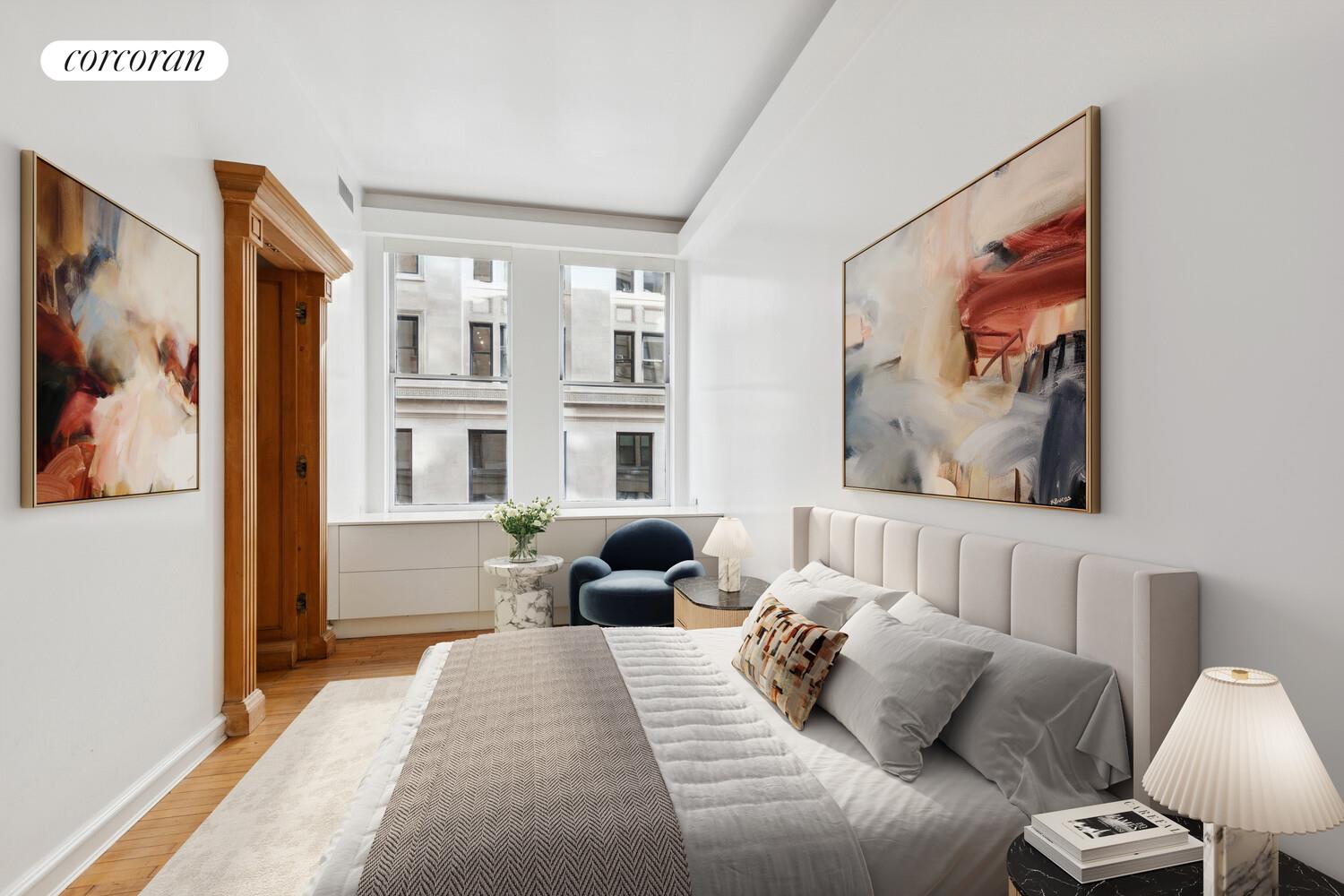 105 5th Avenue, Unit 4B Manhattan, NY 10003 - Photo 4 of 14 a bedroom with furniture and a painting on the wall