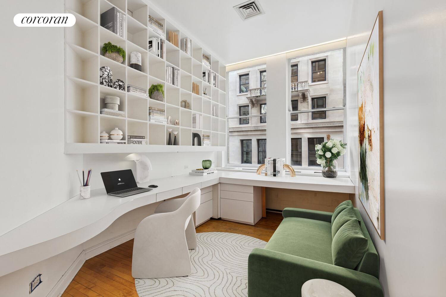 105 5th Avenue, Unit 4B Manhattan, NY 10003 - Photo 5 of 14 a work place with furniture and rug